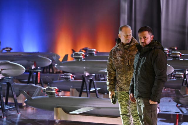 <p>Volodymyr Zelensky and Oleksandr Syrskyi, commander-in-chief of the Armed Forces of Ukraine, next to Ukrainian-made ‘Peklo’ drone missiles</p>