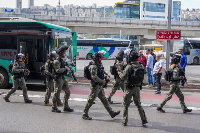 <p>Israeli security forces secure the scene of a stabbing attack in Haifa</p>