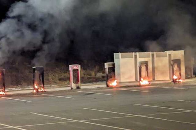 <p>Seven Tesla power stations were torched in Littleton, Massachusetts Monday</p>