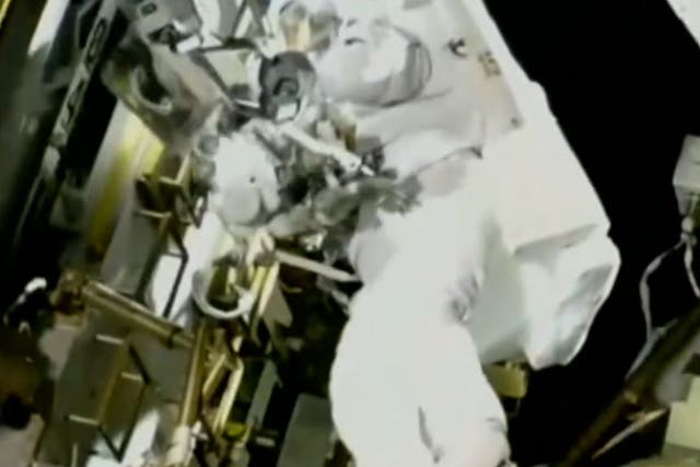 <p>Nasa astronaut trapped in space ventures outside for first time in months.</p>