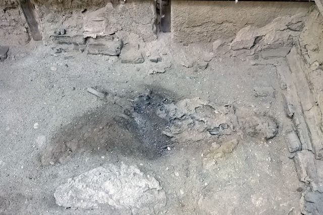 <p>Remains of an individual in their bed at Collegium Augustalium, Herculaneum</p>